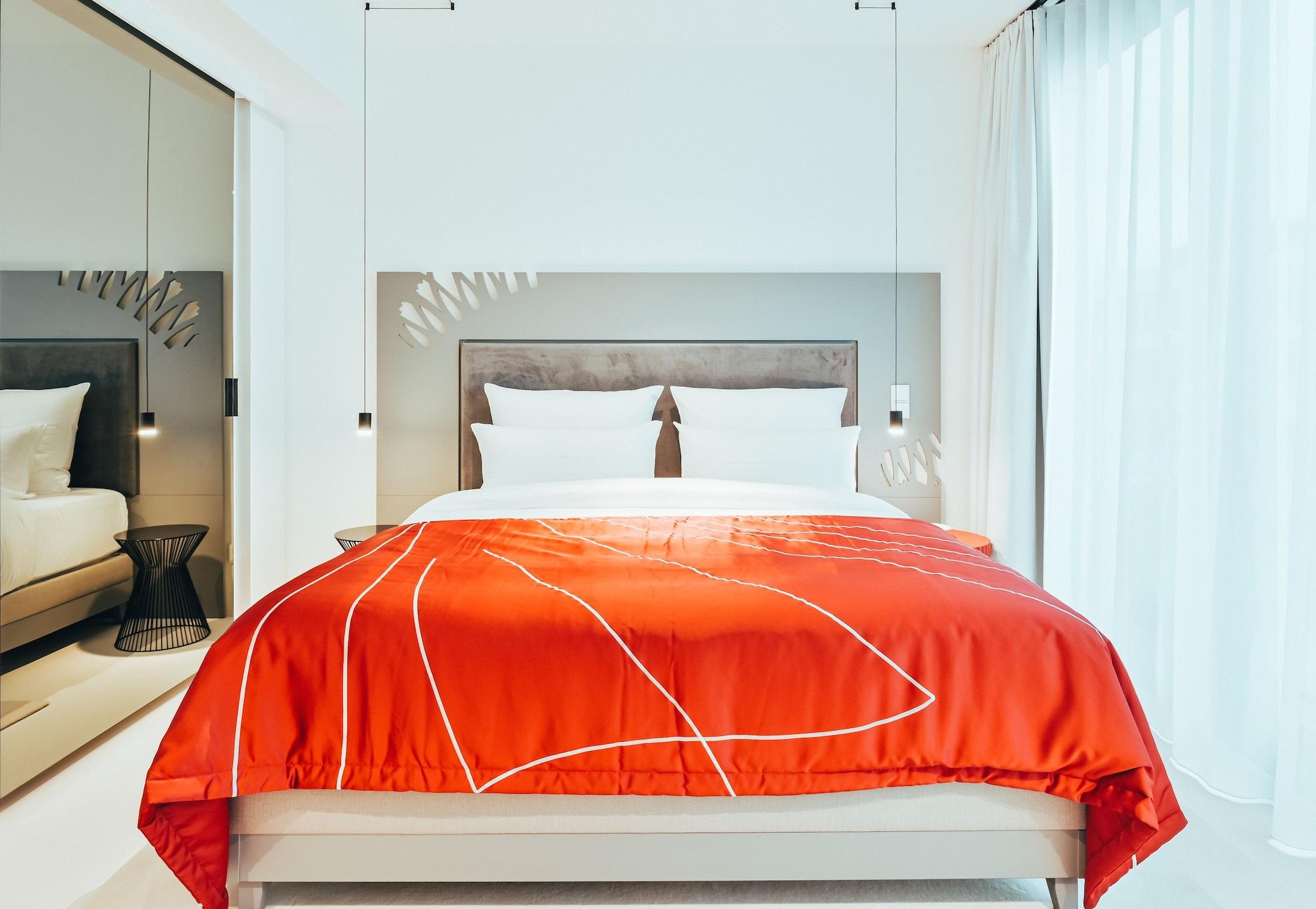 Kpm Hotel & Residences 柏林 外观 照片 A bed with a duvet