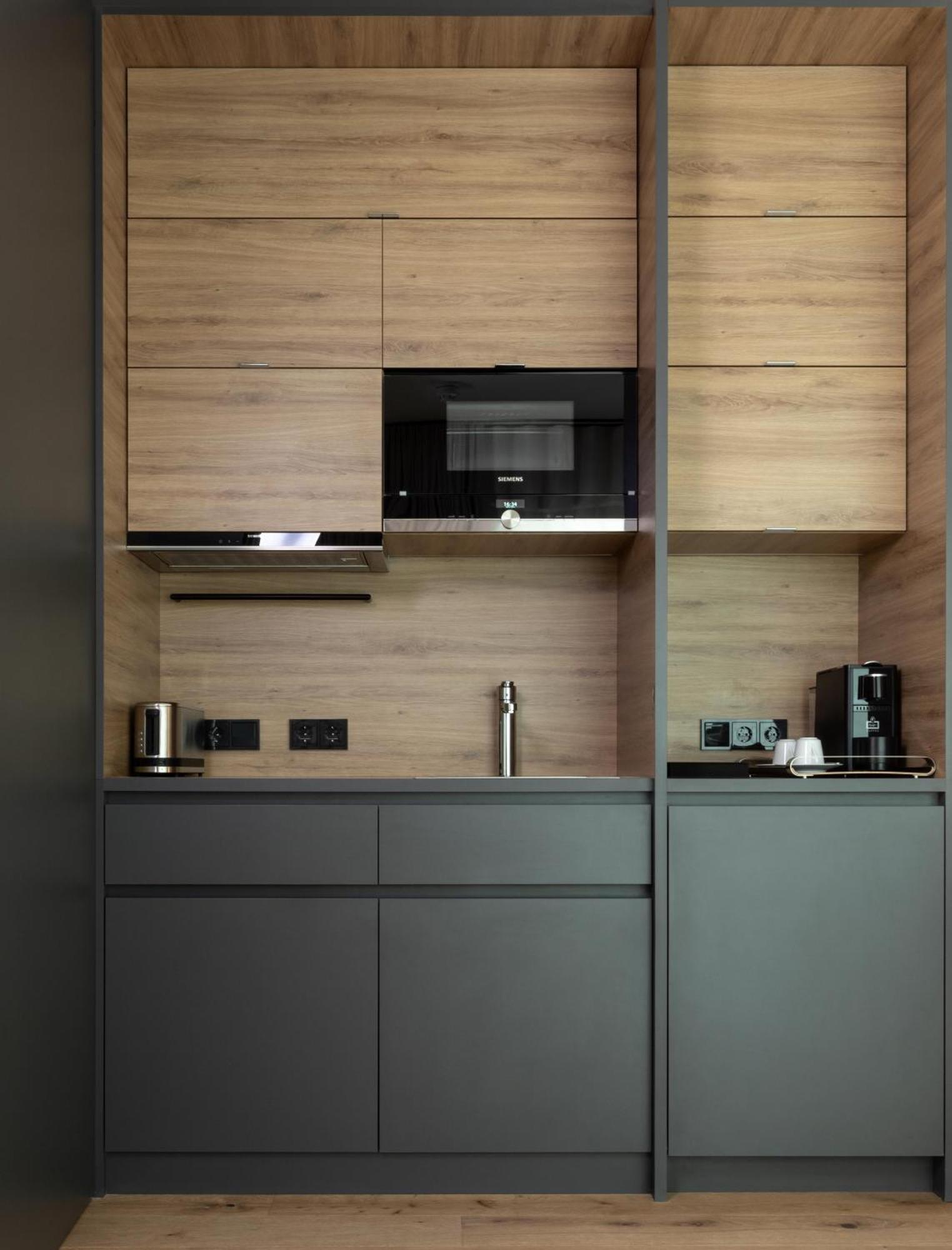 Kpm Hotel & Residences 柏林 外观 照片 A kitchen in a serviced apartment
